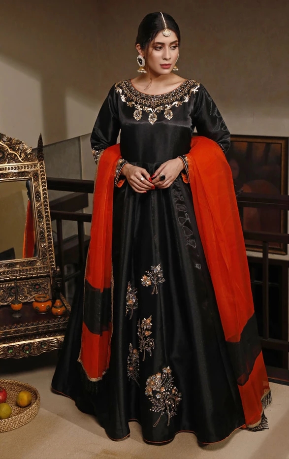 Black dress store with red dupatta